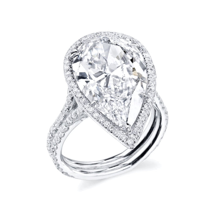 Rothschild Diamond pear diamond engagement ring with halo and pave double band