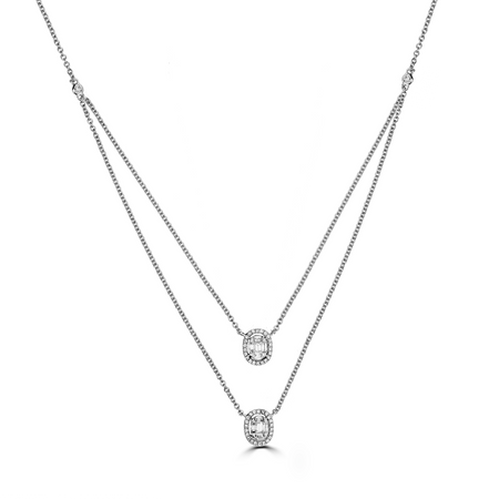 layered diamond pendant necklace with baguette centers and brilliant round diamond halos