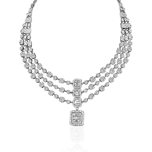 3 layer necklace of baguette and round diamonds with 3 